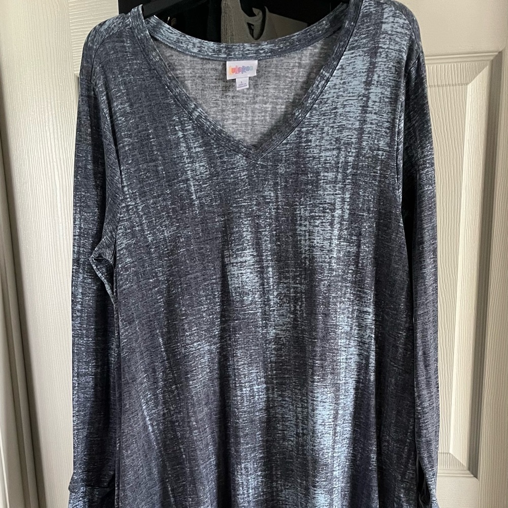 Never worn. Brand new w/o tags